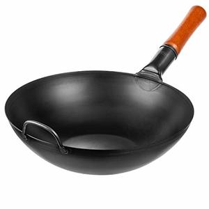 This Carbon Steel Wok Pan Heats Quickly and Evenly for Perfect Cooking Results